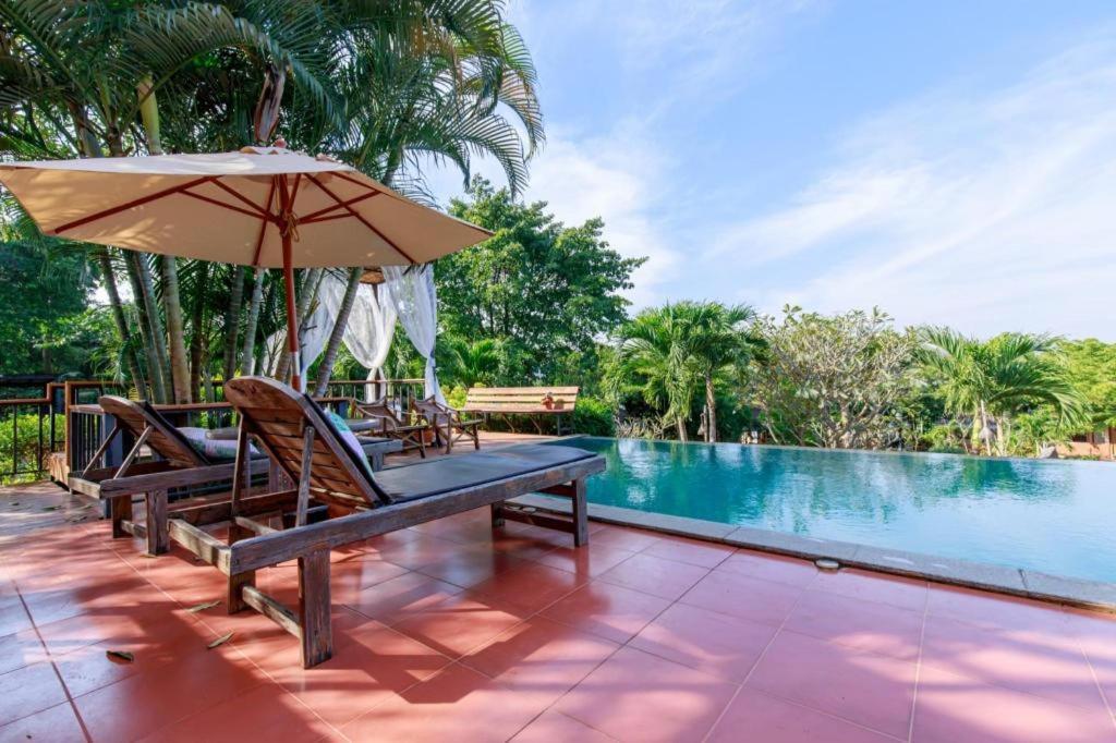 Dusit Talai Resort Mu Si Bagian luar foto