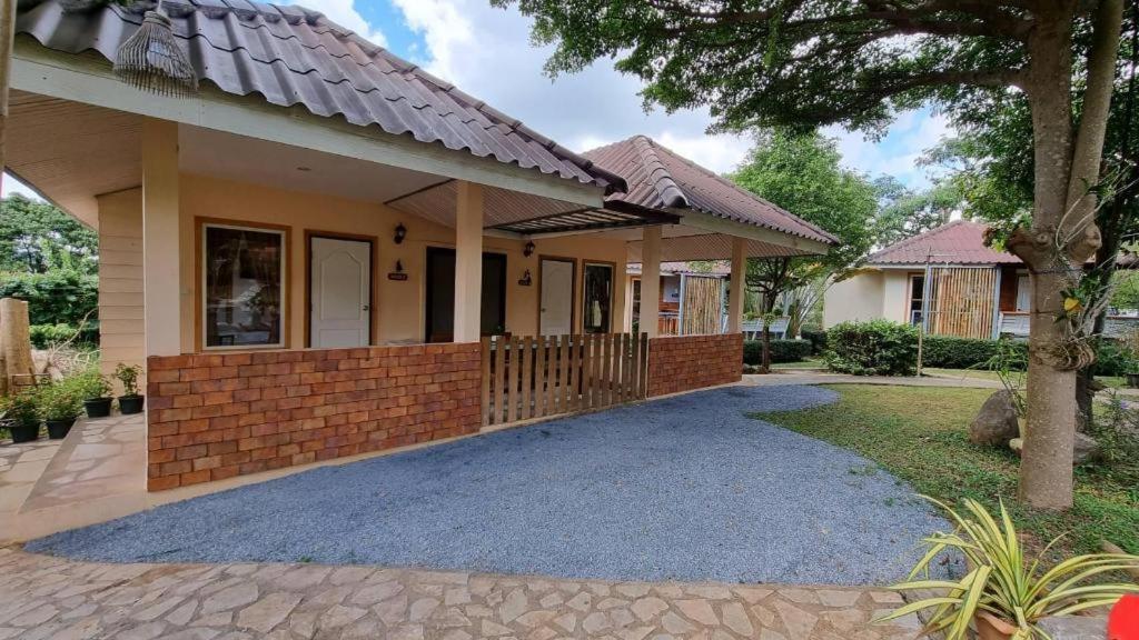 Dusit Talai Resort Mu Si Bagian luar foto
